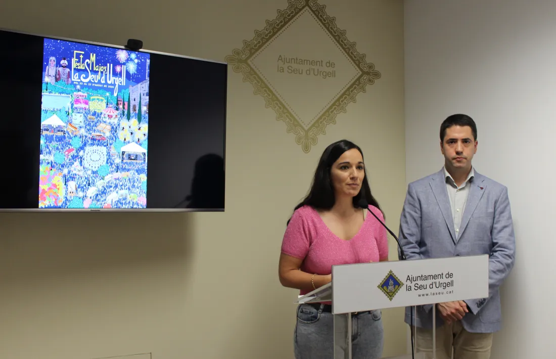 Moreno i Barrera, amb el cartell de l’edició, signat per Xavi Casals. 